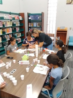 Art class with teacher and students of all ages at the library