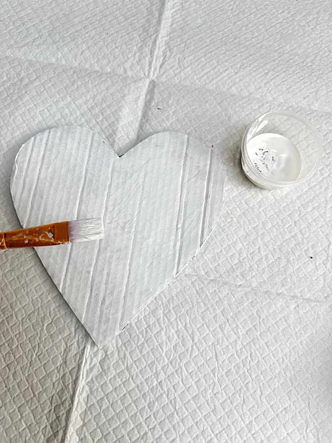 white painted cardboard heart