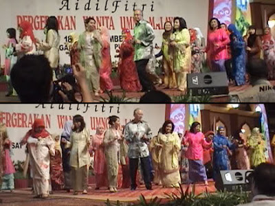singapore al online pentas  di poco kurma bersama kurma UMNO dan wanita atas poco isteri unta