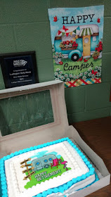 camping trailer cake and banner