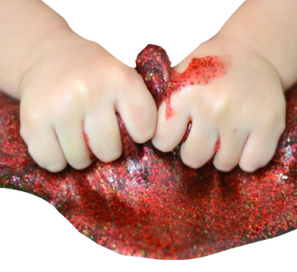 Make super sparkly Santa slime for ultimate holiday fun!  My kids loved making Santa slime farts. #santaclaus #santa #santaslime #santaslimerecipe #santacrafts #santaart #santaactivitiespreschool #christmasslime #christmasslimeforkids #holidayslime #growingajeweledrose #activitiesforkids