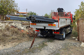 The truck with all our steel arrives