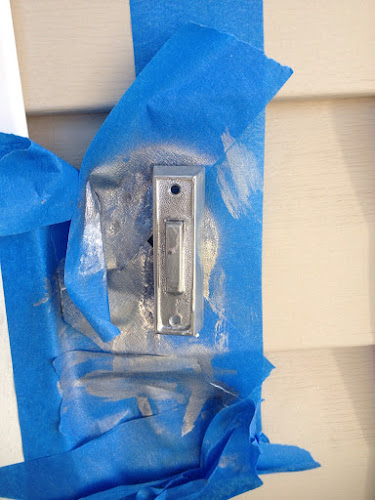 silver painted doorbell