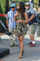 Priyanka Chopra looks super cute in happy mood wearing a short flower print dress in Hollywood 013.jpg