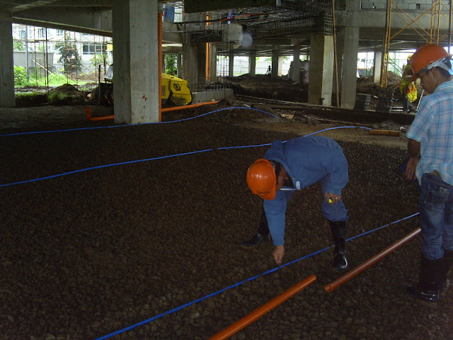 inspecting the alignment of the reticulation pipe