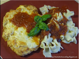 chicken schnitzel with provolone and roasted tomato sauce