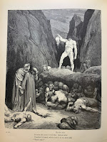 Dante and Virgil observe a group of tortured souls on the ground. Above them, a headless figure holds out its own decapitated head.