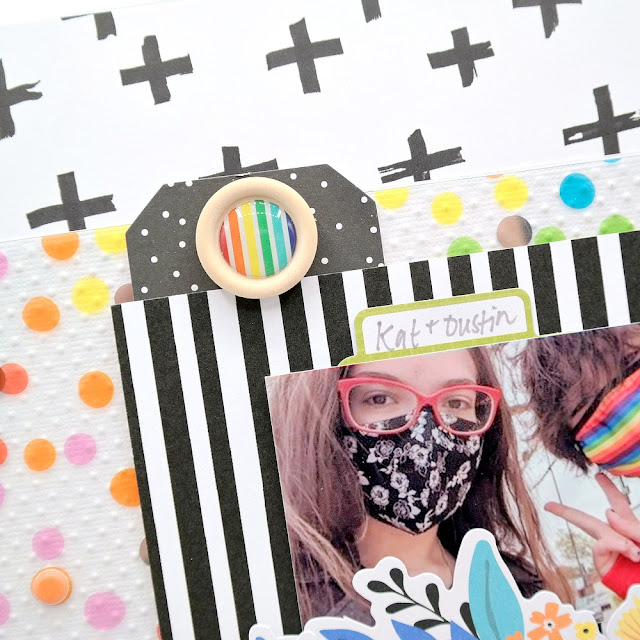 Black and white and rainbow layers on a best friends scrapbook layout.