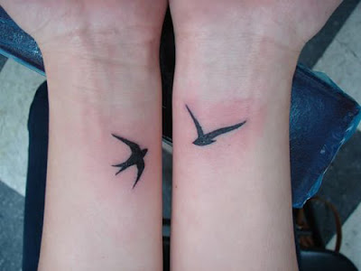 Silhouette Swallow Tattoo