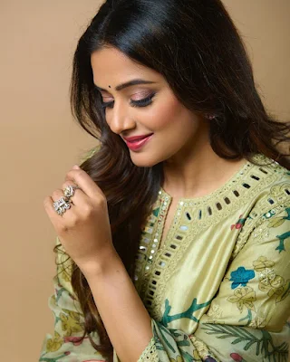 Priyamani smiling and laughing while wearing a casual outfit