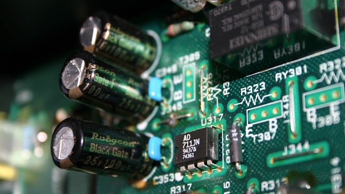 Handling interrupts,timers,and A/D converter in PIC16F877A (Arabic)
