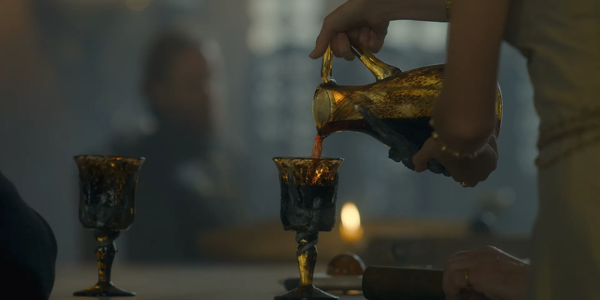 Rhaenyra Pouring drinks in the Glass