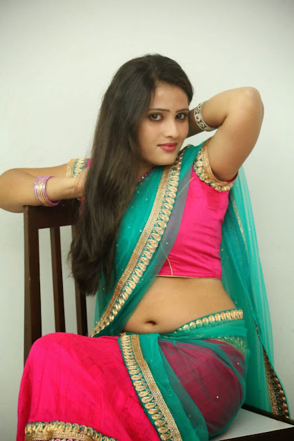 Anusha latest hot navel images in saree