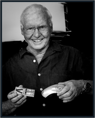 Bob Cameron as he invents a better mousetrap, Toronto portrait photographer Robert Rafton