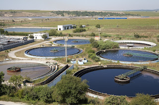 aerial view wastewater treatment plant settling ponds