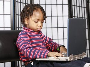 Little Kid Using Computer