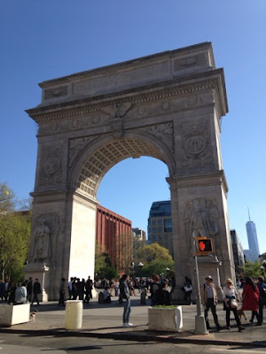 The Arch at Washington Square was modeled after the Arch de Triomphe in Paris;  Freedom Tower in the Background