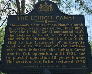 The Lehigh Canal. This canal's 47 miles from Mauch Chunk to Easton were constructed 1827-1829. Here the Lehigh Canal connected with the Delaware Canal to Philadelphia, and with the Morris Canal to New York. Vital to the transport of anthracite coal and to the rise of the anthracite iron industry, the Lehigh Canal was in full operation until 1932, and in partial operation 10 years longer. This section was fully restored, 1976.