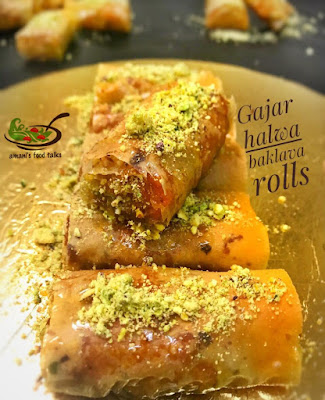 Baklava is a rich, sweet dessert made of layers of phyllo filled with chopped nuts and held together with syrup or honey. I made this baklava dish with gajar ka halwa and it was a success :)