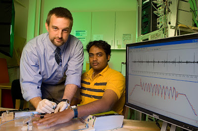 UD scientist Christopher Knight (left) and graduate student Dhiraj Poojari are examining the nerves and muscles of the index finger to shed light on how our motor-control system, which rules movement, changes as we age.