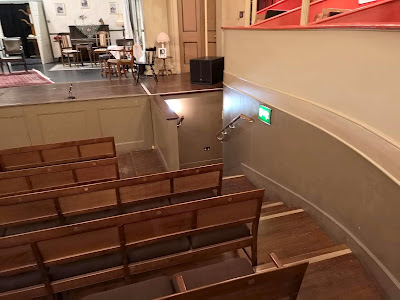 View from the pit showing the entrance to the right  Theatre Royal, Bury St Edmunds