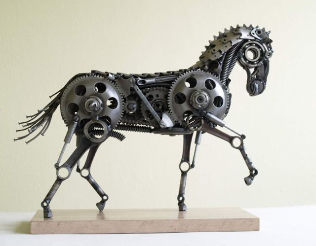 steampunk sculptures from old car and motorcycle parts