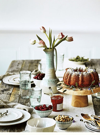 colorful bohemian kitchen furniture and decor including dinner ware and glasses from Anthropologie