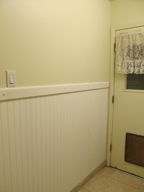 Laundry room makeover before