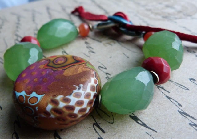 and the colors in this really are great with the green and red beads