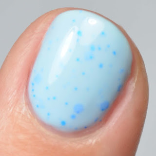 blue nail polish with neon blue glitter