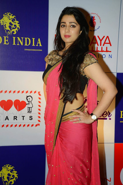 Actress Charmy Kaur Latest Pictures in Pink Saree at CCL Charity Dinner 40.JPG