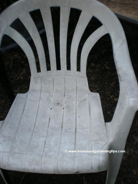 Dingy looking lawn or patio furniture can be easily reclaimed with a coat of paint. Note the 3 holes drilled in the bottom of the chair.  This allows the rain water to drain from the chair so you don't get a soggy butt after a rain storm.