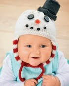 http://www.letsknit.co.uk/free-knitting-patterns/snowman-baby-hat