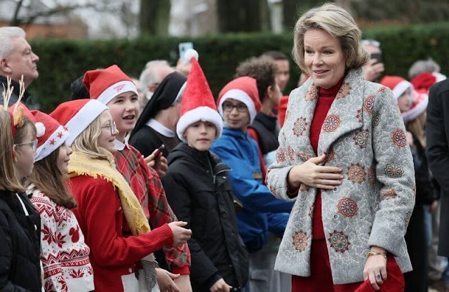 Queen Mathilde wore a felt embroidered jacket by Carnet Como. ASBL Francoise Schervier rest and care home in Chaudfontaine