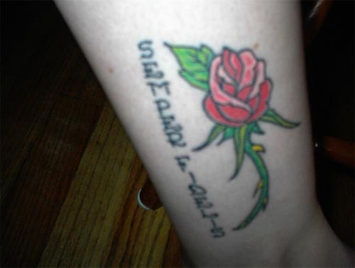 purple rose tattoo. purple rose tattoo