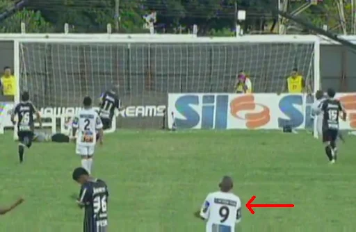 Comercial player Elionar Bombinha can't hide his happiness after his team conceded a goal