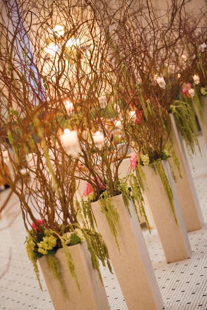The reception guest tables were decorated with various centerpiece styles