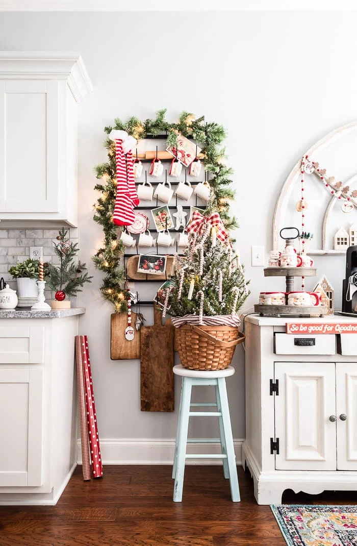 lighted garland, mug rack, stockings, mini tree, Santa mugs