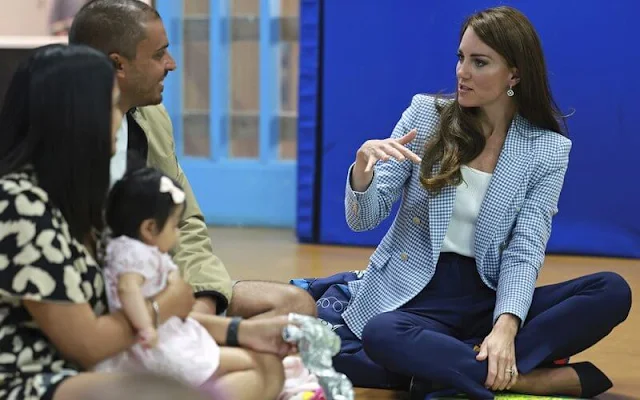 Princess of Wales wore a new baby blue gingham blazer by Zara and a white puff sleeve tank top by Ralph Lauren