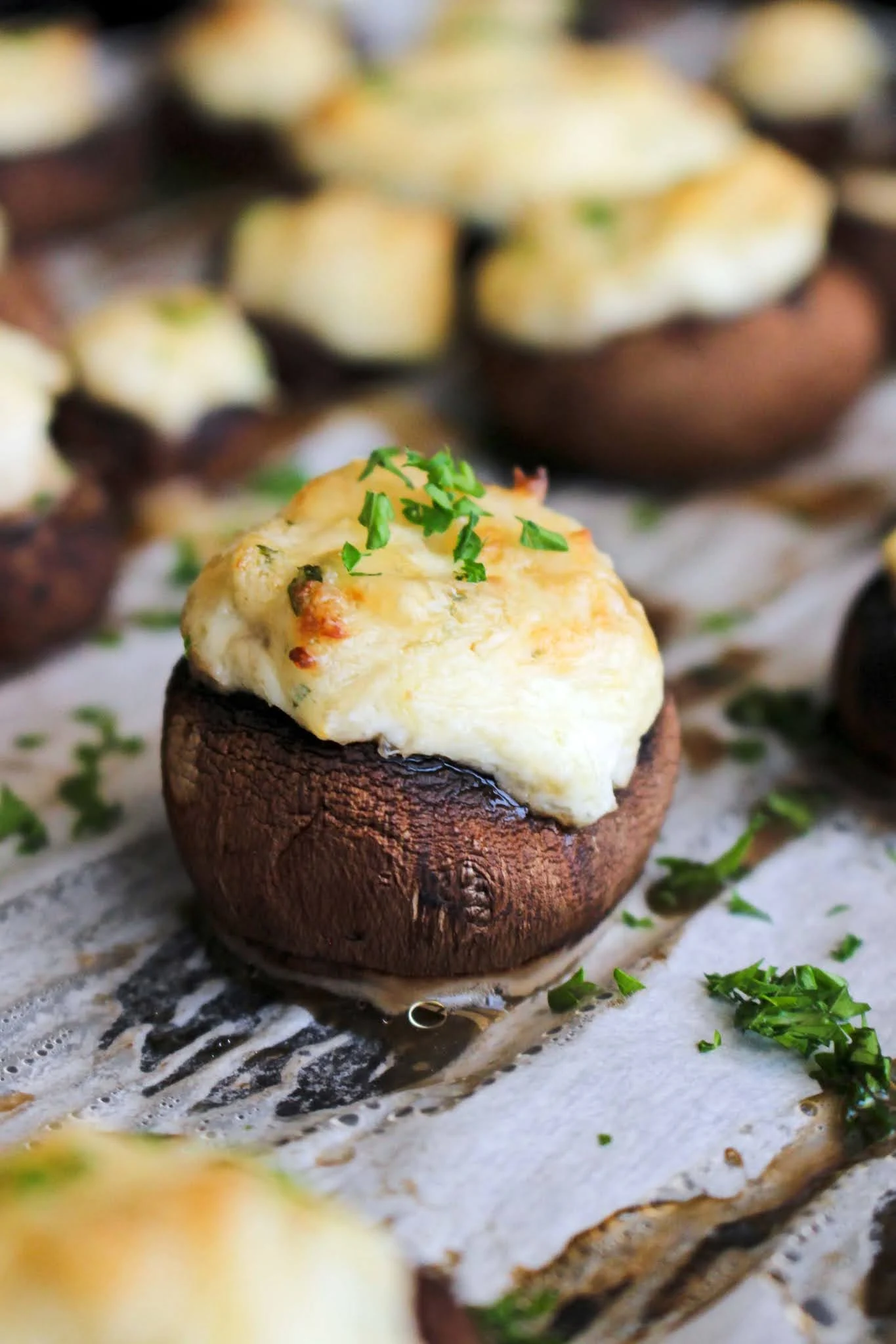 These are the best Crab and Cream Cheese Stuffed Mushrooms! They are elegant, yet easy to make and perfect for any occasion. Try them on Thanksgiving or Christmas! #stuffedmushrooms #crab #appetizer