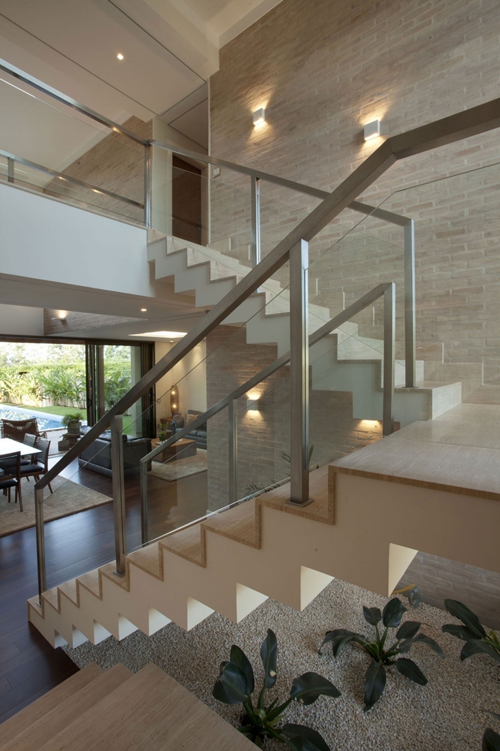 Modern stairs in Elegant dream home in Sao Paulo by Pupo Gaspar Arquitetura