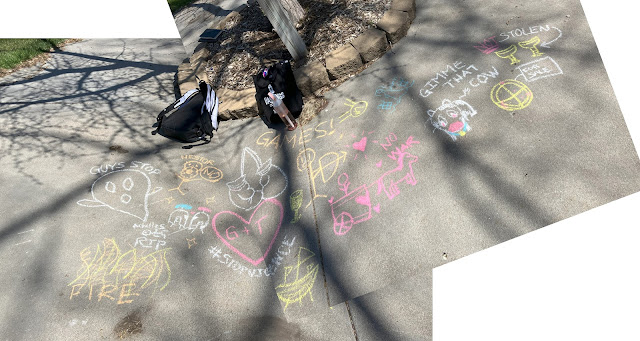 Sidewalk chalk drawing of the prizes for Achilles's funeral games.