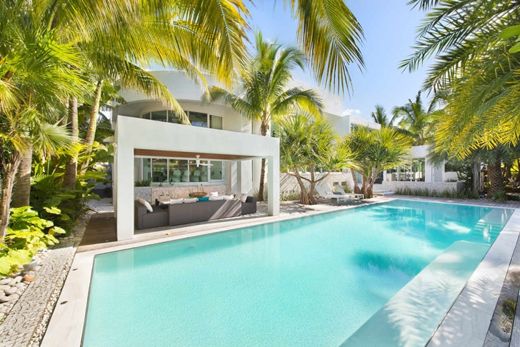 Swimming pool in the backyard of Modern mansion in Miami