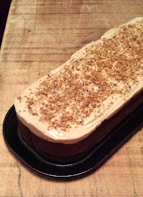 Roasted banana bread with brown butter frosting and caramelised pistachios