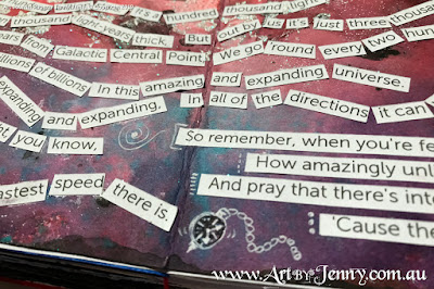 closeup of the lyrics for Galaxy Song on the galaxy mixed media artwork by Jenny James