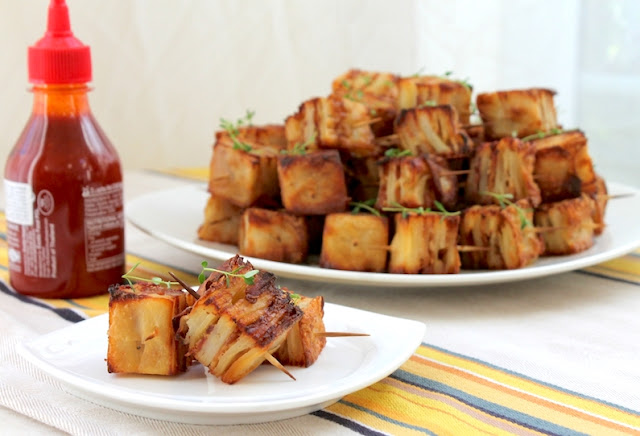 Food Lust People Love:Parmesan Bacon Potato Squares are a tasty appetizer (or side dish) of thinly sliced potatoes layered with bacon, cream and cheese that turn crispy and more-ish when they are baked, cooled then cut into squares and roasted in the oven.