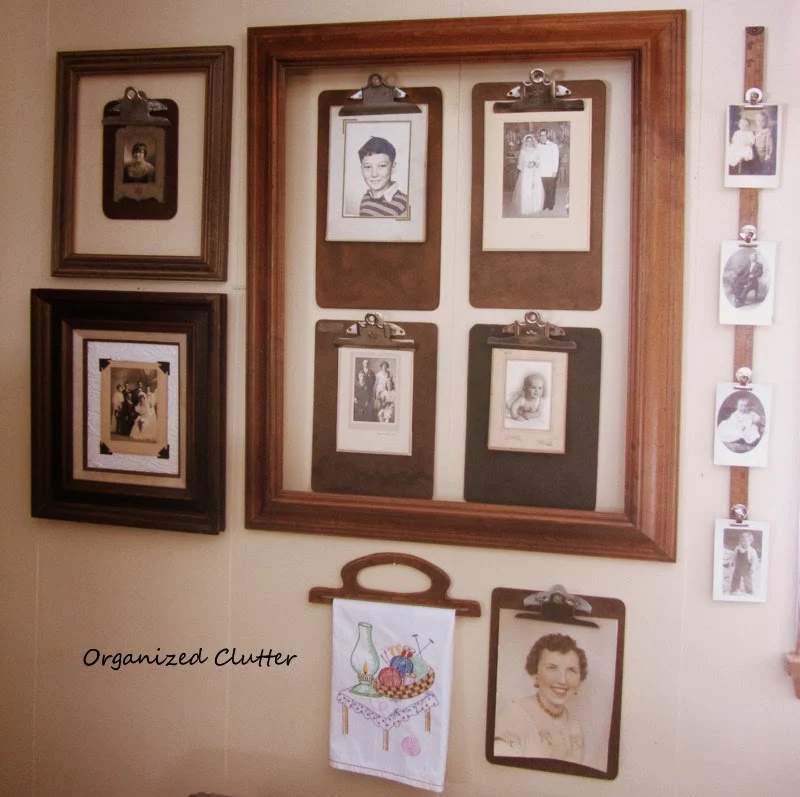 Clipboard Photo Wall www.organizedclutterqueen.blogspot.com