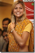 Russian tennis player Maria Kirilenko wears a sari as she poses during a photo shoot