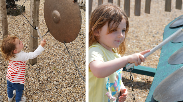 Images taken at Tattershall Farm Park show 18 month old girl using a stick to bang a gong. Next image shows the same girl at 3 years old using a stick to play a brightly coloured outdoor xylophone