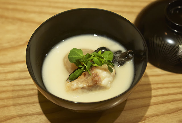 Sake Paste Soup (Kasujiru) with turnip, black trumpet mushrooms, kelp bass and watercress. photo by NAOKO TAKAGI